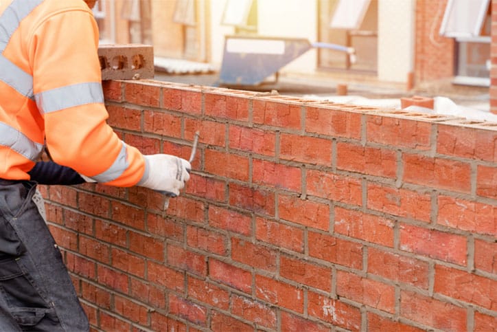 Brick Contractor Rebuilding Brick Wall